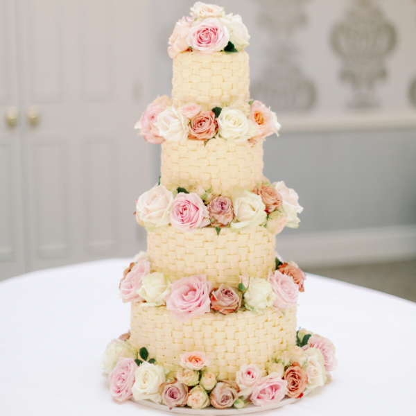 4 Tiered Wedding Cake with Fresh Flowers - Image by: Camilla Hards Photography at Lords of Manor Hotel, Cotswolds