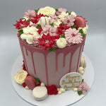 Floral buttercream cake with macarons at Vanilla Pod Bakery