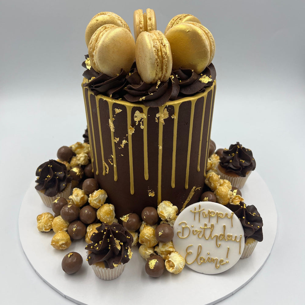 Chocolate and gold drip cake at Vanilla Pod Bakery