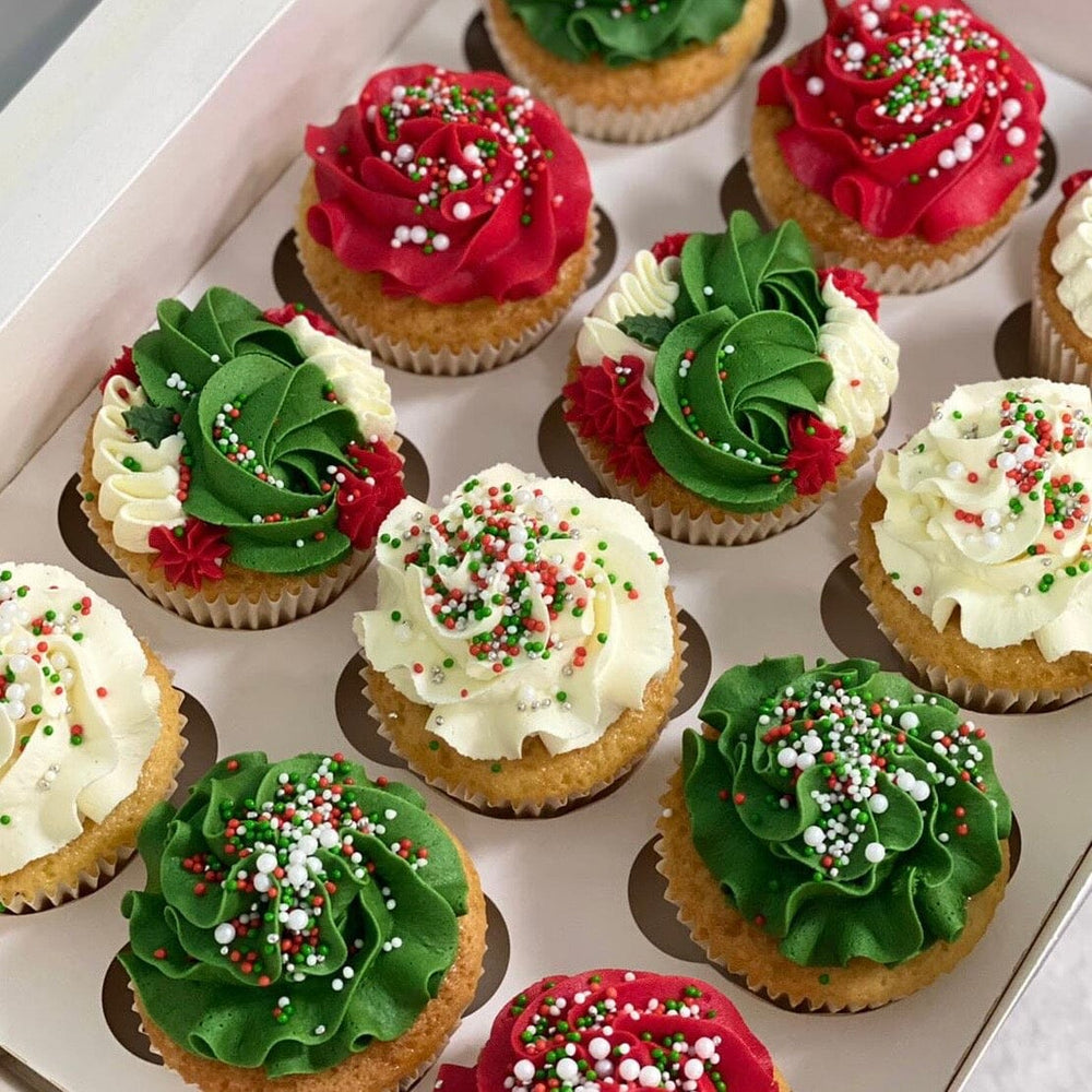 
            
                Load image into Gallery viewer, Red, White and Green Christmas Cupcakes At Vanilla Pod Bakery
            
        