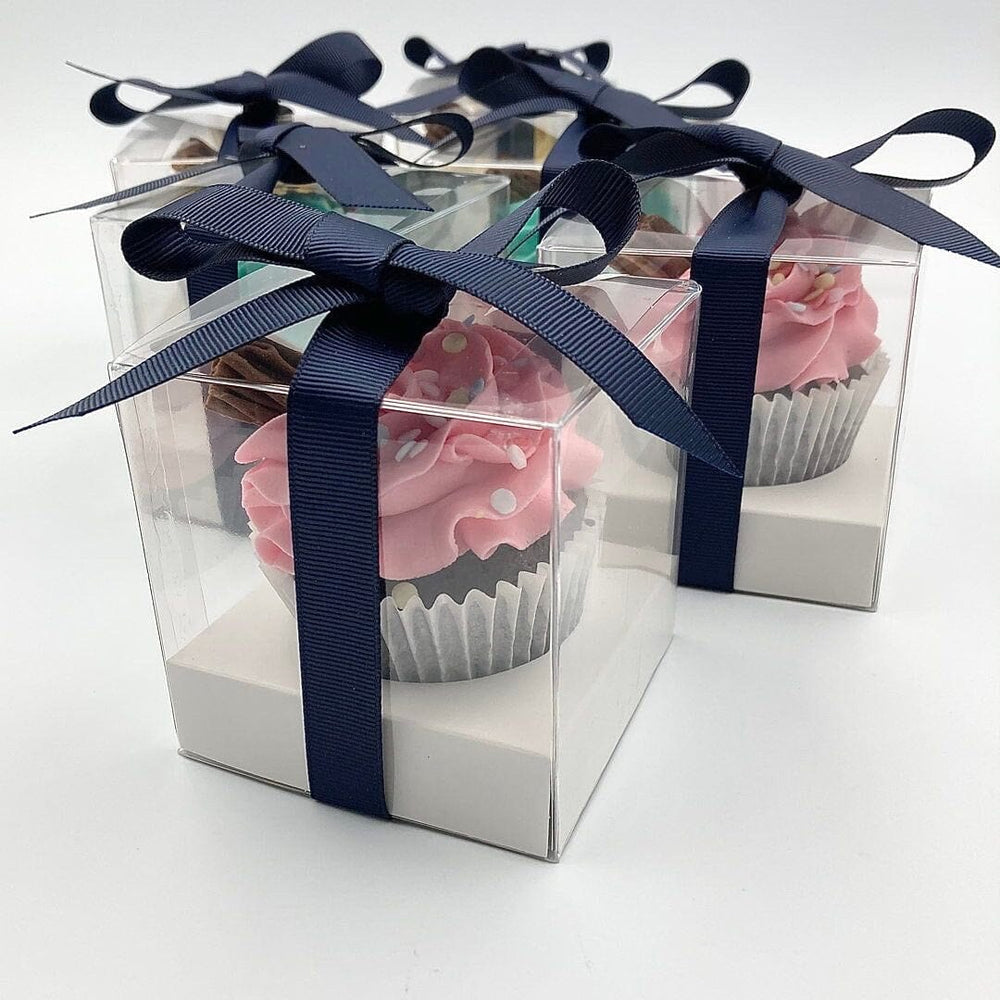 Individual Cupcake Packaging Vanilla Pod Bakery 6x Clear Individual Box tied with Navy Blue Ribbon 