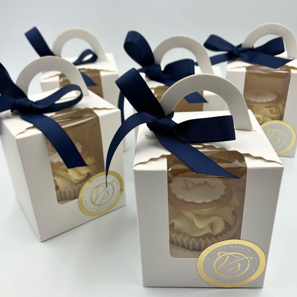 Individual Cupcake Packaging Vanilla Pod Bakery 6x White Individual Box tied with Navy Blue Ribbon 
